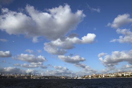 Fluffy white clouds over Istanbul Bosphorusの写真素材