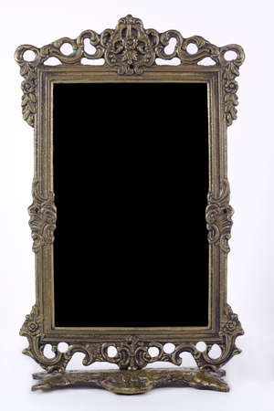 Antique blank photo frame with isolated black interiorの写真素材