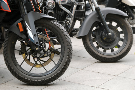 Close-up motorcycle wheels and a disc brake lockの写真素材