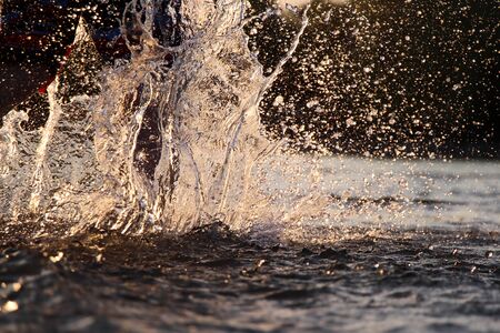 splashing water from the feetの写真素材