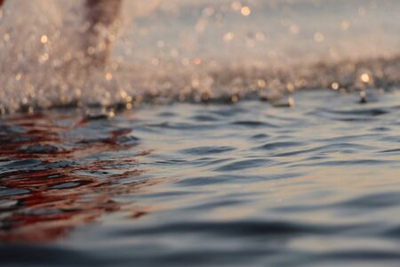 Bright background with splashing dropsの写真素材