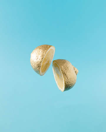 Orange sliced on pastel pink background. Minimal fruit concept.の写真素材