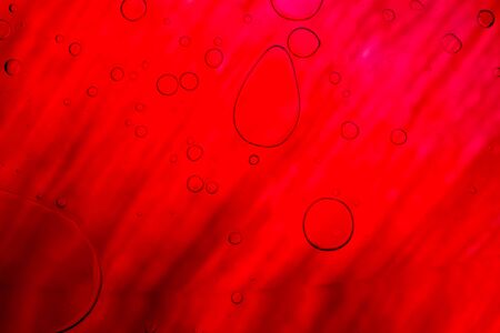 Abstract bright red background with bubblesの写真素材