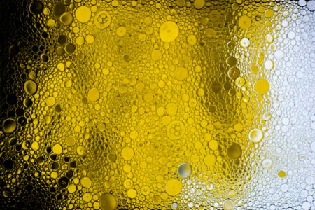 Black, yellow and white abstract background with bubblesの写真素材