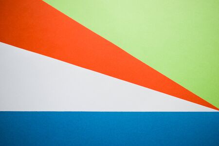 Blue, white, orange and green backgroundの写真素材