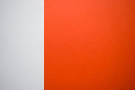 White and orange background divided vertically