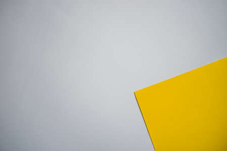 Yellow and white geometric, colored paperの写真素材
