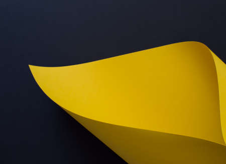 Abstract black and yellow colored paper backgroundの写真素材