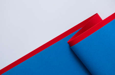 Blue and white 3d background divided with red stripeの写真素材