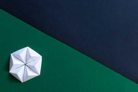 Black and green geometric origami divided backgroundの写真素材