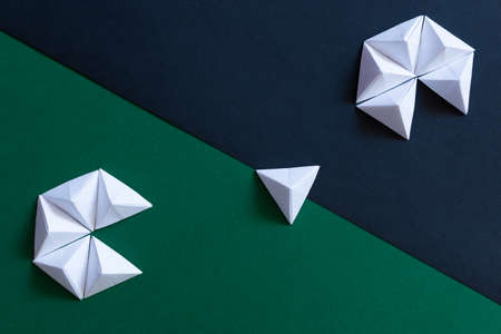 Geometric origami black and green background. Group and individual, different thinking conceptの写真素材