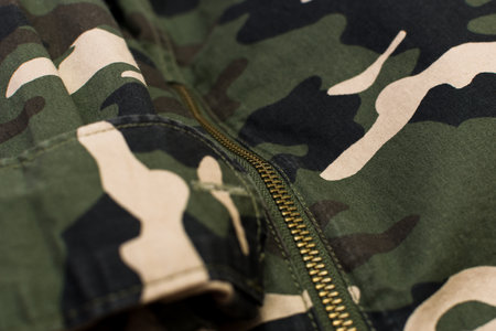 Military camouflage uniform with zipper, close up