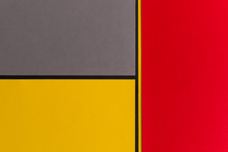 Gray, yellow and red geometric background with empty space