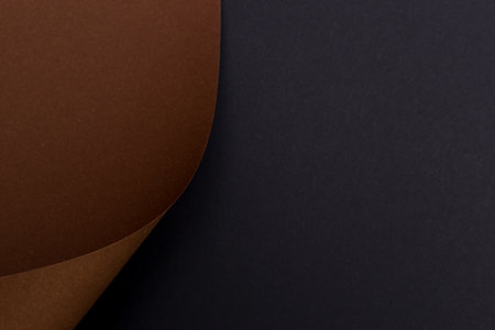 Curved abstract brown and black background with empty spaceの写真素材