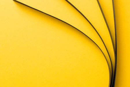 Abstract yellow background with black 3d stripesの写真素材