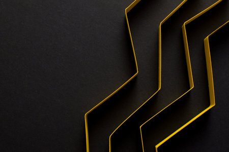 3d yellow stripes on black background, top viewの写真素材