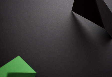 Green and black 3d geometric background, copy empty space