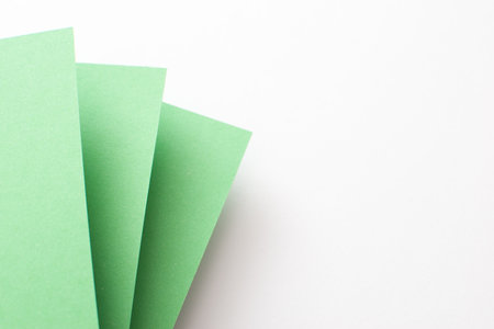 Green and white 3d geometric background with copy empty space