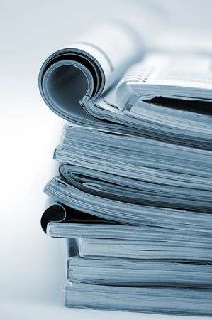 Stack of magazines in blue tonedの写真素材