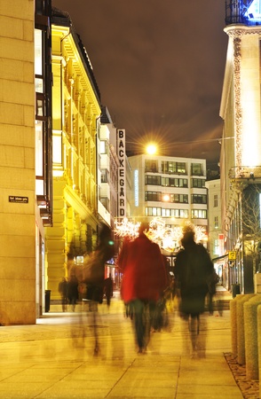 Oslo, Norway - 16 Dec, 2011: Christmas shopping in central Oslo by nightのeditorial素材