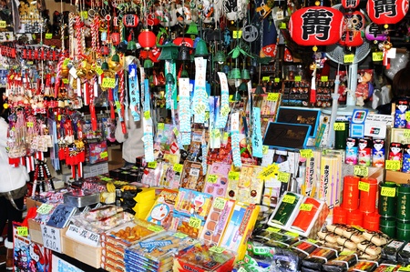 Tokyo, Japan - 31 December, 2011: Religious objects displayed in bazaar at Sensoji temple market in Asakusa, Tokyoのeditorial素材