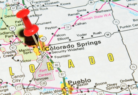 London, UK - 13 June, 2012: Colorado Springs marked with red pushpin on the United States map.