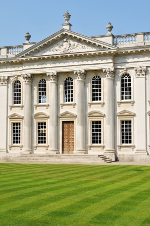 Cambridge, UK - April 25th, 2011: Architectural detail of beautiful mansion and green lawn in Cambridge, England のeditorial素材