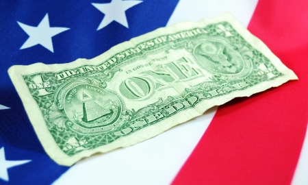 London, UK - September, 2011: American dollar concept with banknote and American flag のeditorial素材