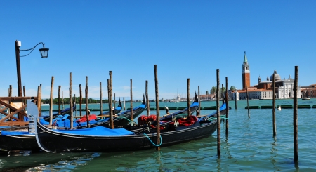 Venice, Italy - 06 May, 2012:  Gondolas overlooking the famous San Giorgio Maggiore basilica in Venice, Italy のeditorial素材