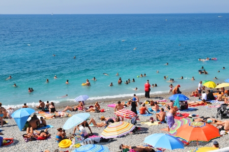 Nice, France - 27 July, 2013  Tourists sunbathe on French Riviera, one of the most important tourist destination in Europe  のeditorial素材