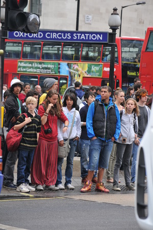 LONDON, UK - AUGUST 23, 2010: Businessmen and pedestrians at rush hour in central Londonのeditorial素材
