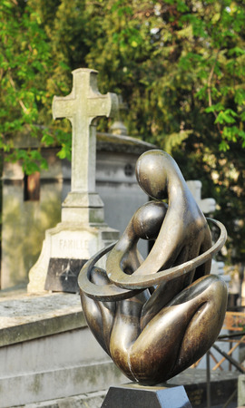 PARIS, FRANCE - MARCH 29, 2011: Modern funerary art in the Montmartre Cemetery (Cimeti?re de Montmartre), a famous cemetery in Paris, France.のeditorial素材