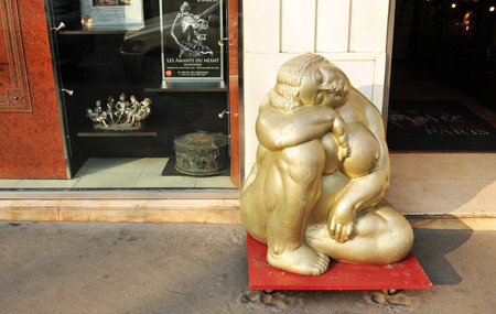 PARIS, FRANCE - MARCH 29, 2011: Detail of nude statue at the entrance of Erotic Museum in Parisのeditorial素材
