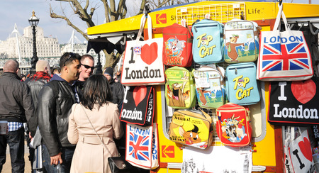 LONDON, UK - MARCH 5, 2011: Tourists buy souvenirs at kiosk near London\\\\のeditorial素材