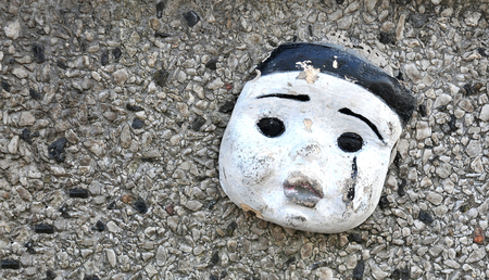 Abstract grunge background with doll faceの写真素材