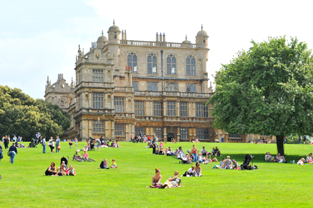 NOTTINGHAM, UK. JUNE 1, 2014: Tourists admire the beautiful architecture of Wollaton Hall, an Elizabethan country house.のeditorial素材