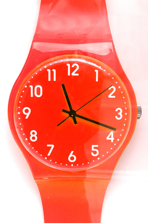 Close up of red watch isolated on white
