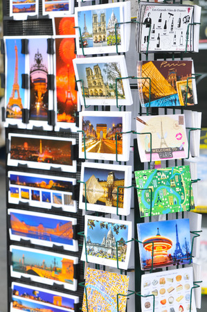 Paris, France - July 8, 2015: Detail of various postcards for sale depicting Parisian landmarks in Place de la Concorde, Paris, Franceのeditorial素材