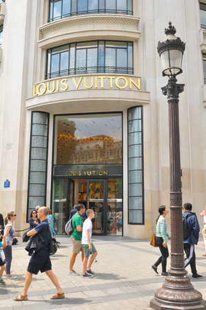 Paris, France - July 8, 2015: Entrance to the Louis Vuitton luxury fashion store on Champs Elysees in central Paris, Franceのeditorial素材