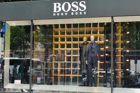 Paris, France - July 9, 2015: Entrance to the Hugo Boss luxury fashion store on Champs Elysees in central Paris, Franceのeditorial素材