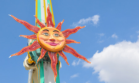 Paris, France - July 9, 2015: Detail of abstract sun against blue sky in amusement park by Louvre Museum in Jardin des Tuileries, Parisのeditorial素材