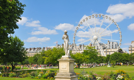 Paris, France - July 9, 2015: Roue de Paris ferris wheel overlooks the Tuileries gardens in Paris, France.のeditorial素材