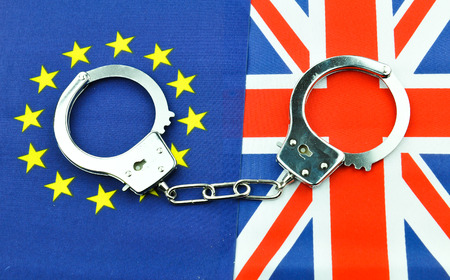 Brexit referendum concept with EU and UK flags and handcuffsの写真素材