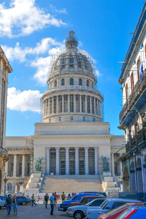 Havana, Cuba - December 19, 2016: Capitol building (El Capitolio) overlooks the streets of Habana Vieja (Old Havana) in Cubaのeditorial素材