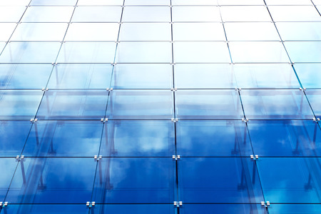 modern building with blue glass panelingの写真素材