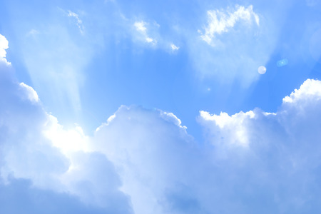 sky with clouds and shining sunの写真素材