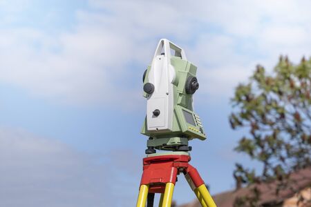 professional surveying stations for measuring the angle and distance outdoors, precisely modern equipmentの写真素材