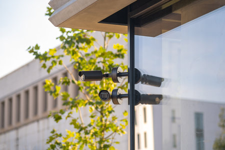 a camera system guards a modern buildingの写真素材