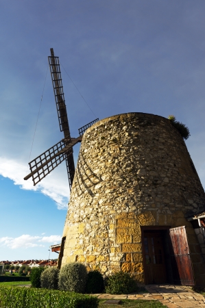 Mill with storm clouds in Getxo, Spainの写真素材