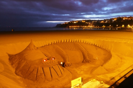 Sandy dragon in Getxo beachのeditorial素材